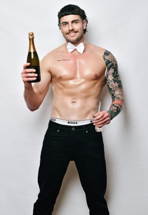 sydney topless waiter aidan holding champagne bottle